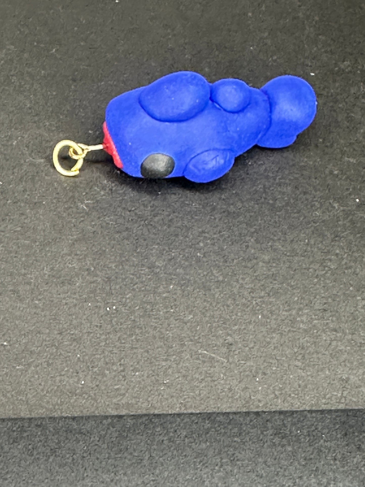 polymer clay hooked fish charm